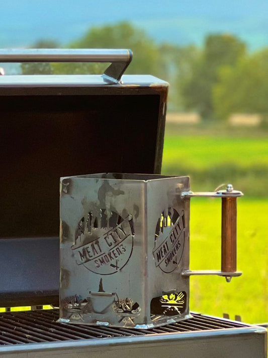 Super Grill with a scenic background of green fields and mountains